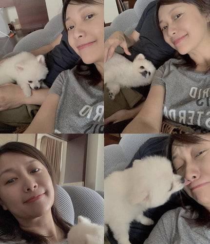 徐静蕾罕见晒照秀恩爱,倚靠男友黄立行身旁心情大好